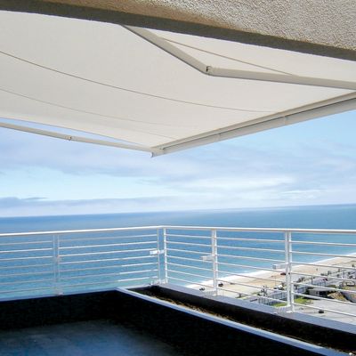 Toldo para balcones sistema de brazos invisibles